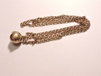 Lot 33 - A silver gilt and gold cased Masonic ball charm