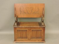 Lot 684 - An oak monk's bench