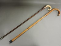 Lot 343 - An early 20th century 9ct gold mounted ivory tusk walking cane