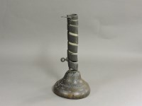 Lot 404 - A 17th century coil candlestick