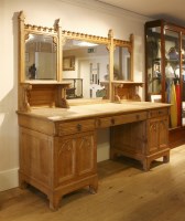 Lot 777 - A Victorian Gothic pale oak sideboard