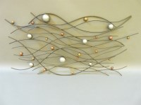Lot 456 - A 1950s metal piece of wall art