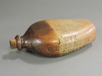 Lot 275 - A Victorian stoneware two tone gin bottle