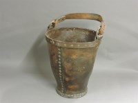 Lot 557 - A 19th century leather fire bucket