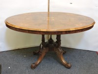Lot 758 - A Victorian walnut inlaid oval centre table