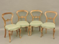 Lot 755 - A set of four Victorian rosewood balloon back chairs