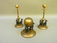 Lot 301 - A pair of brass candlesticks