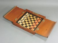 Lot 184 - A 19th century travelling chess set