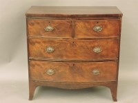Lot 668 - A 19th century mahogany veneered bow front chest of drawers