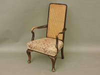 Lot 731 - An early 20th century bergère back armchair