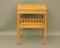 Lot 707 - A 19th century stripped pine clerk's desk