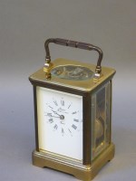 Lot 324 - A French brass carriage clock