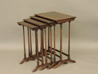Lot 815 - A nest of four inlaid mahogany occasional tables