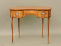 Lot 727 - An Edwardian satinwood ladies kidney shaped writing table