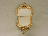 Lot 712 - A 19th century gilded mirror