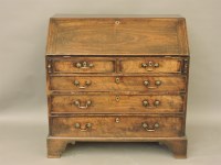 Lot 706 - A George III mahogany housekeeping bureau