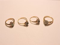 Lot 13 - A 9ct gold sapphire and diamond oval cluster ring