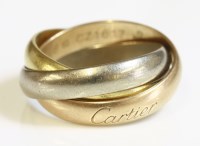 Lot 495 - A Cartier three colour gold trinity ring