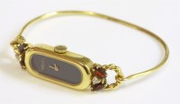 Lot 481 - A ladies' 9ct gold Roy King mechanical bangle watch