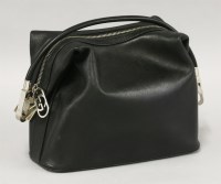 Lot 196 - A Gucci black leather shoulder bag
