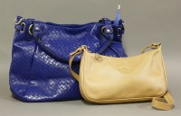 Lot 204 - A Longchamp tan leather shoulder or cross-the-body bag