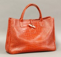 Lot 205 - A Longchamp red leather tote bag