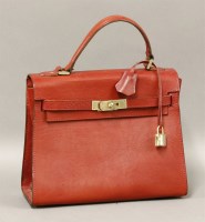 Lot 233 - A Baronessa Franchetti red leather handbag