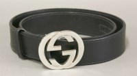 Lot 142 - A Gucci black leather belt