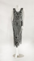 Lot 155 - A 1930s black tulle evening overlay dress