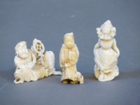 Lot 148 - Two late 19th century Japanese ivory okimono