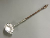 Lot 256 - A silver toddy ladle