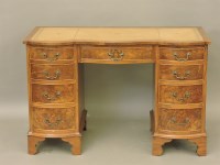 Lot 749 - A Bevan Funnell 'Reprodux' mahogany kneehole desk