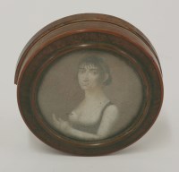 Lot 204 - A 19th century French tortoiseshell circular snuff box