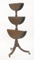 Lot 601 - A George III mahogany dumb waiter