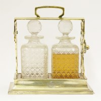 Lot 39 - An Edwardian silver gilt tantalus