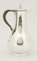 Lot 60 - A George III silver hot water jug