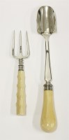 Lot 180 - A late Victorian silver cheese scoop with turned ivory handle