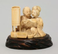 Lot 1199 - A rare ivory shunga okimono