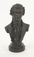 Lot 1335 - A plaster cast and bronze effect bust of a musician