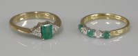 Lot 1020 - A 9ct gold emerald and diamond seven stone lozenge shaped ring