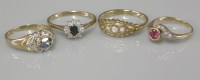 Lot 1046 - A 9ct gold blue and topaz diamond ring