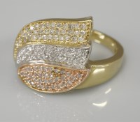Lot 1027 - A 9ct three colour gold pavé set leaf spray ring