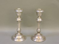Lot 1283 - A pair of silver candlesticks