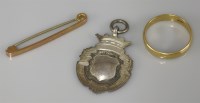 Lot 1059 - A plain wedding ring