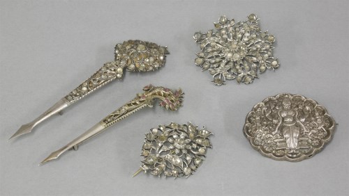 Lot 1078 - Two Sri Lankan kondakoora hair cups