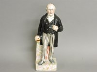 Lot 1393 - A Victorian Staffordshire figure of Disraeli