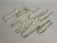 Lot 1121 - A collection of George III and later silver sugar tongs