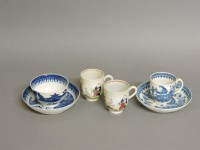 Lot 1325 - Two Worcester polychrome painted teacups