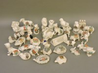 Lot 1375 - A collection of over thirty-five crested china animals