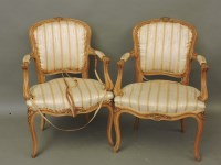 Lot 593 - A pair of French beech framed fauteuils